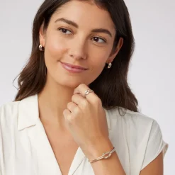 The Met Store Herakles Knot Hoop Earrings* Earrings